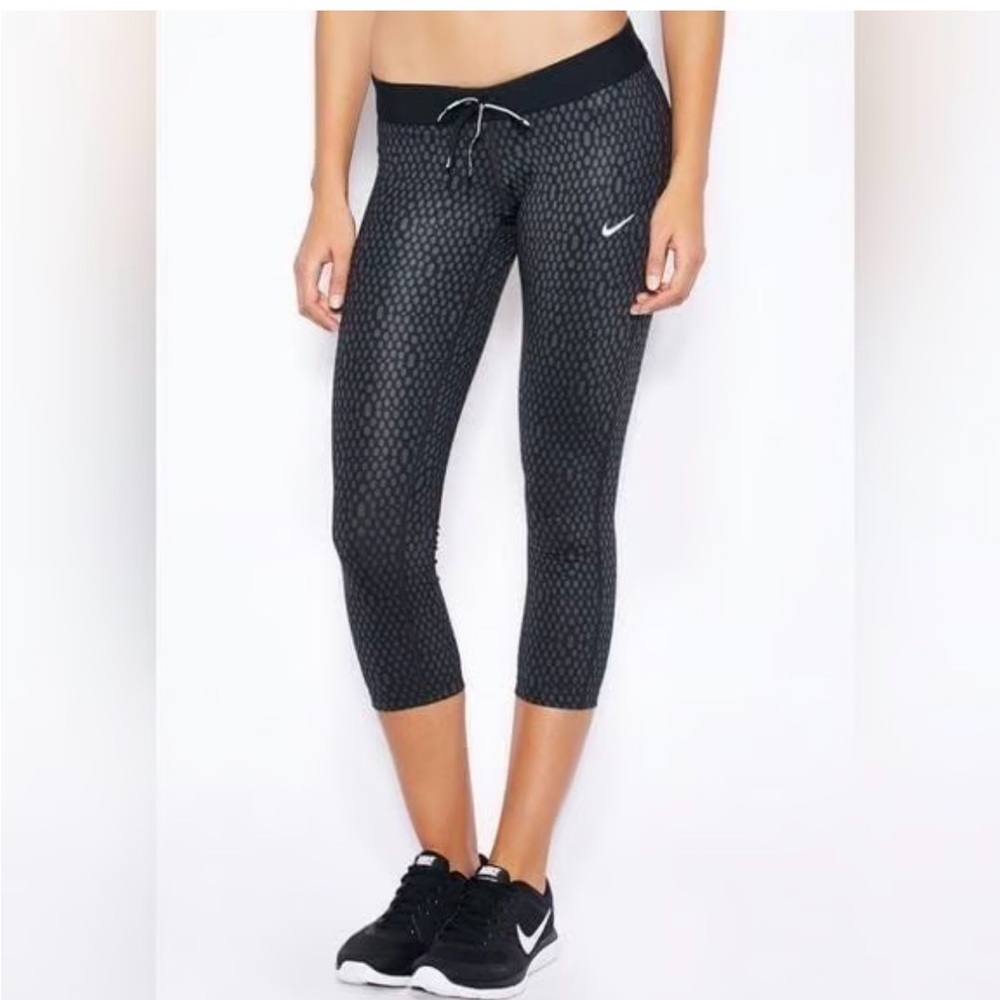 Size medium Nike Mirror Mesh Relay Tights athletic workout capri zip pocket